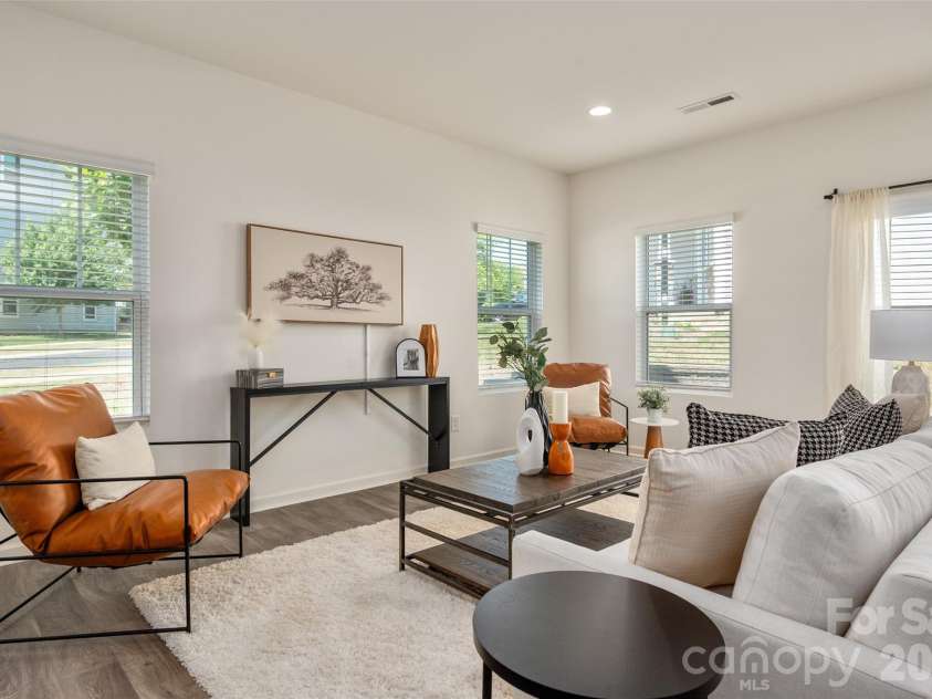 13205 Gadwal Pintail Drive, Charlotte, NC 28262.  MLS# CAR4380012, YatesRealty ID 27656. Imagine relaxing in this beautiful living room!