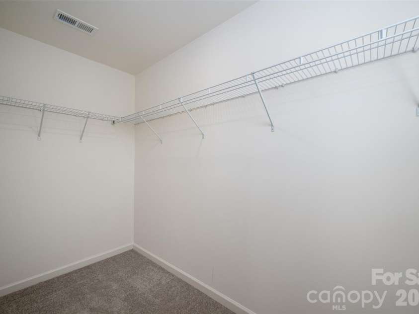 13205 Gadwal Pintail Drive, Charlotte, NC 28262.  MLS# CAR4380012, YatesRealty ID 27656. Spacious closet in the primay suite.