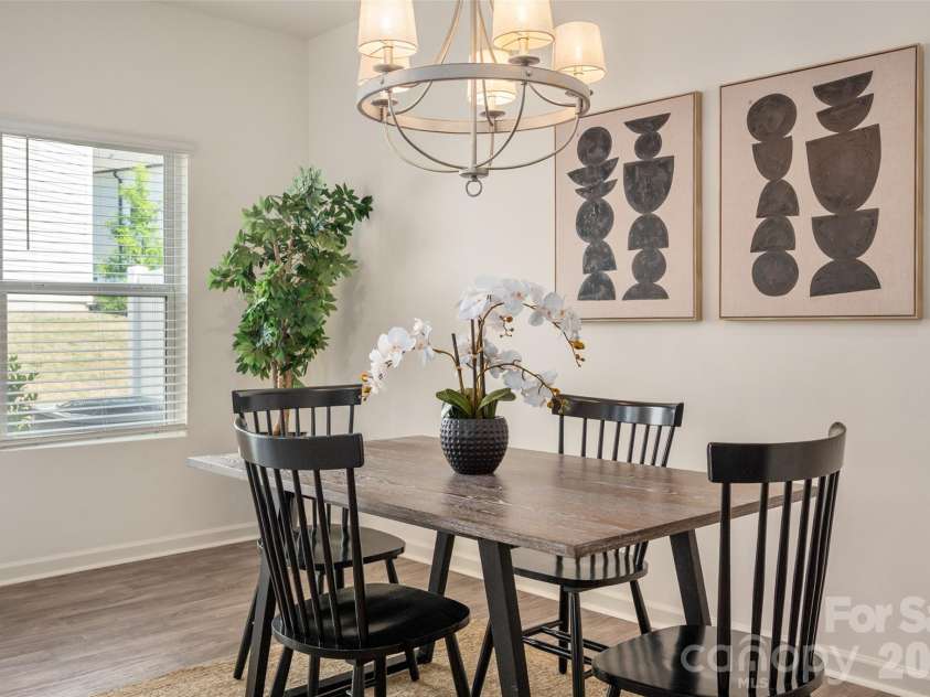 13205 Gadwal Pintail Drive, Charlotte, NC 28262.  MLS# CAR4380012, YatesRealty ID 27656. There's ample room in this dining area.
