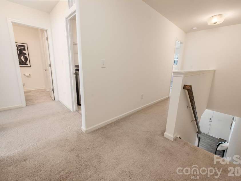 13205 Gadwal Pintail Drive, Charlotte, NC 28262.  MLS# CAR4380012, YatesRealty ID 27656. Upstairs landing.