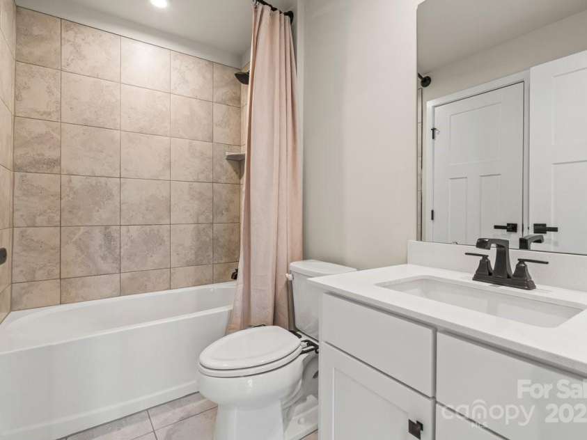 932 Portrush Lane, Tega Cay, SC 29708.  MLS# CAR4279795, YatesRealty ID 27656. Lower Level Full Bath