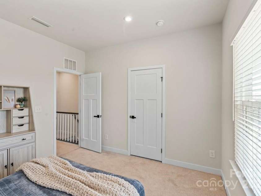 932 Portrush Lane, Tega Cay, SC 29708.  MLS# CAR4279795, YatesRealty ID 27656. Upper Level Secondary Bedroom