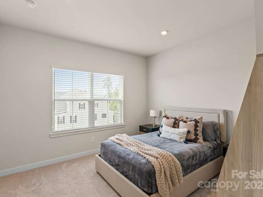 932 Portrush Lane, Tega Cay, SC 29708.  MLS# CAR4279795, YatesRealty ID 27656. Upper Level Secondary Bedroom