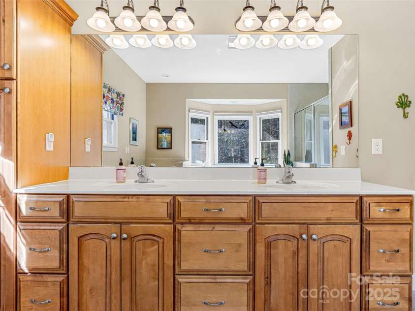 872 Aberdeen Lane, Pisgah Forest, NC 28768.  MLS# CAR4231636, YatesRealty ID 27659. Two lavatories & plenty of storage here