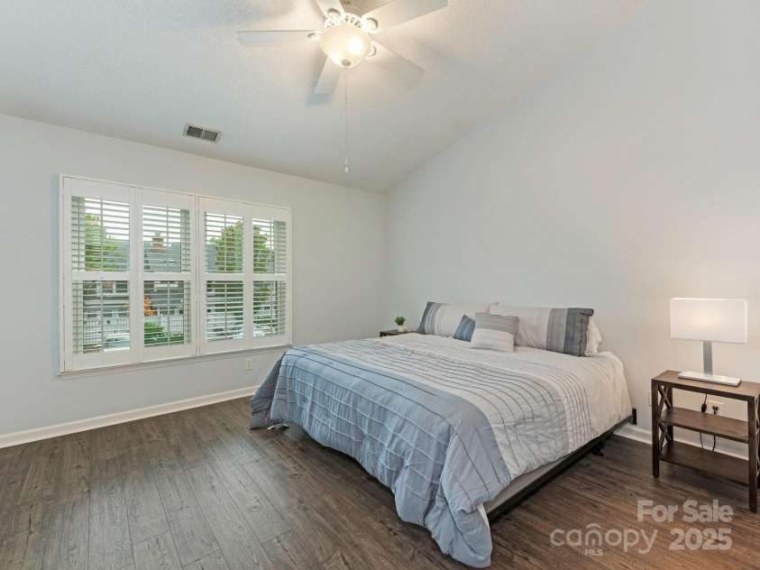 8251 Tradd Court, Charlotte, NC 28210.  MLS# CAR4247585, YatesRealty ID 27663. Primary bedroom with vaulted ceiling