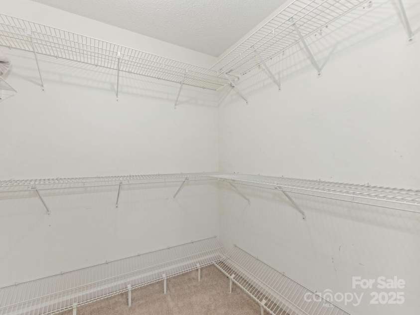 8251 Tradd Court, Charlotte, NC 28210.  MLS# CAR4247585, YatesRealty ID 27663. Primary walk-in closet