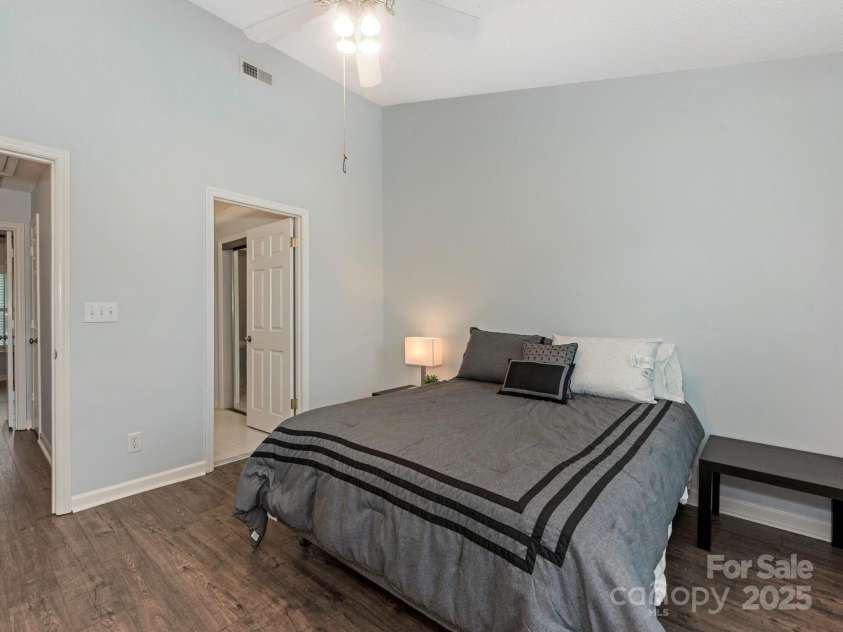 8251 Tradd Court, Charlotte, NC 28210.  MLS# CAR4247585, YatesRealty ID 27663. Secondary bedroom with vaulted ceiling
