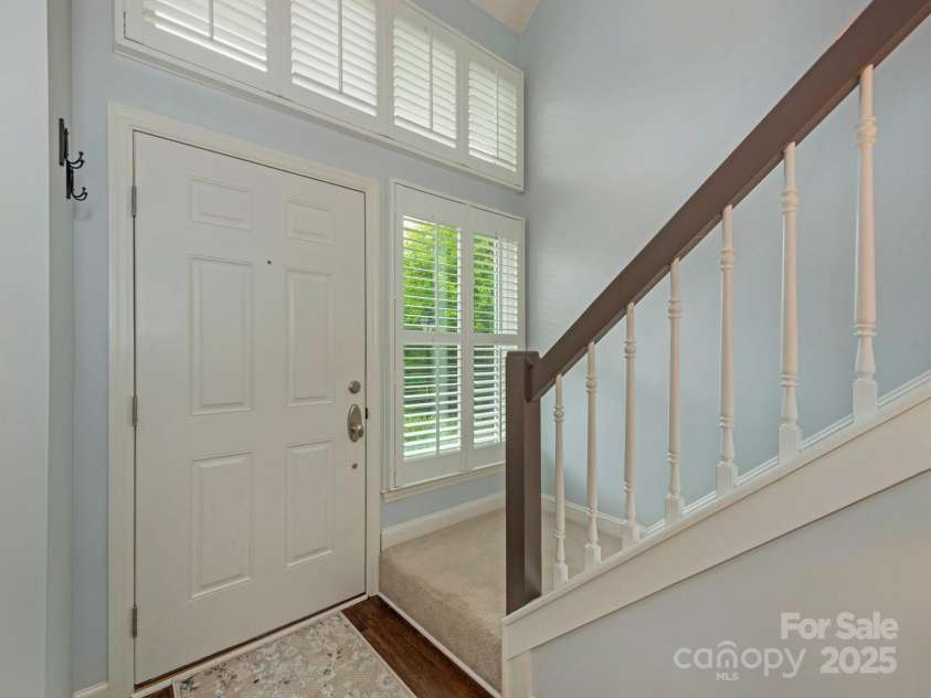 8251 Tradd Court, Charlotte, NC 28210.  MLS# CAR4247585, YatesRealty ID 27663. Two story sunlight-flooded entry