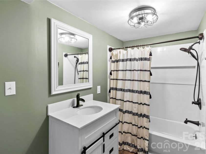180 Center Street, Cooleemee, NC 27014.  MLS# CAR4381275, YatesRealty ID 27664. 