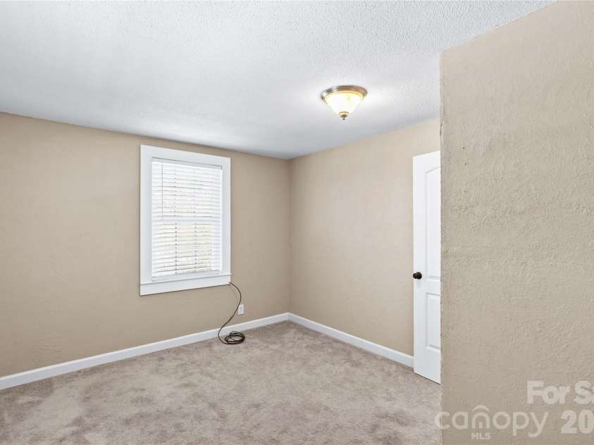 180 Center Street, Cooleemee, NC 27014.  MLS# CAR4381275, YatesRealty ID 27664. 