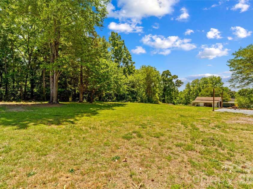 180 Center Street, Cooleemee, NC 27014.  MLS# CAR4381275, YatesRealty ID 27664. 