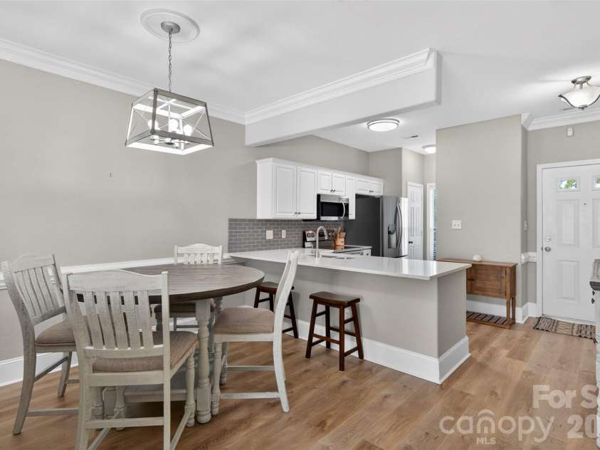 4071 Center Place Drive, Harrisburg, NC 28075.  MLS# CAR4380893, YatesRealty ID 27667. Kitchen and Dining Area