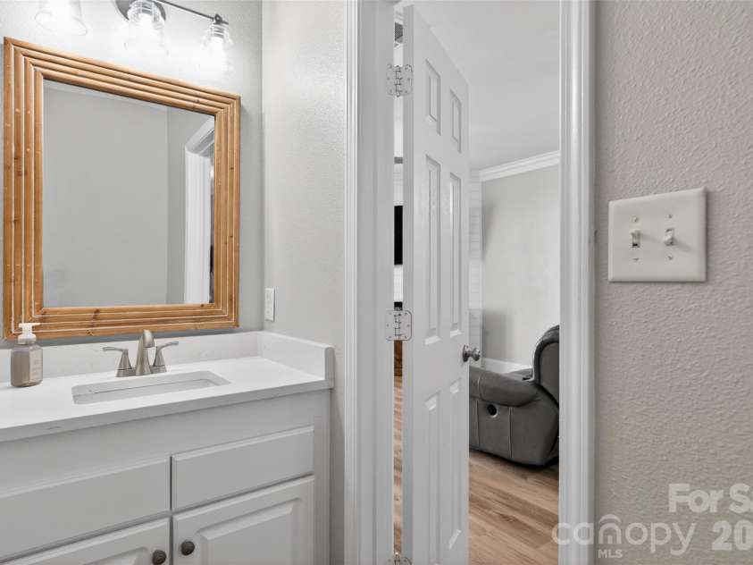 4071 Center Place Drive, Harrisburg, NC 28075.  MLS# CAR4380893, YatesRealty ID 27667. Main Level Half Bath