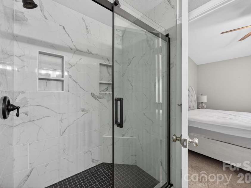 4071 Center Place Drive, Harrisburg, NC 28075.  MLS# CAR4380893, YatesRealty ID 27667. Primary Bath w/Tile Shower