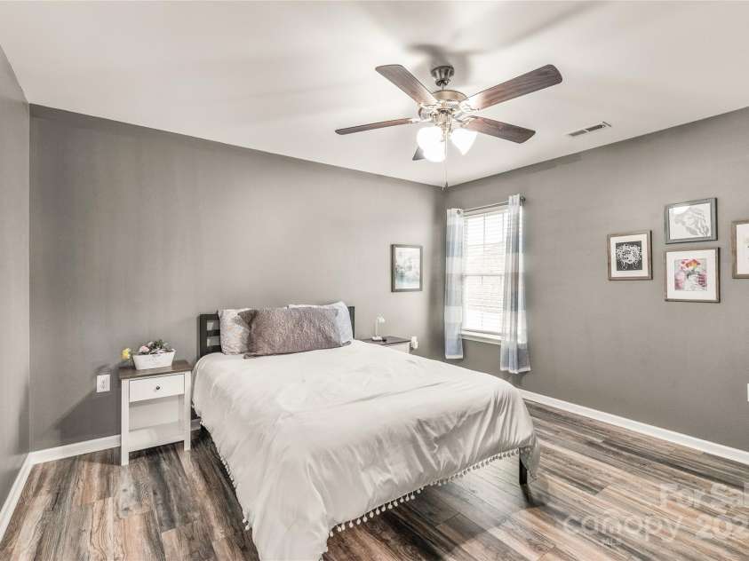 3215 Roan Street, Concord, NC 28027.  MLS# CAR4328709, YatesRealty ID 2767. First guestroom with walk in closet