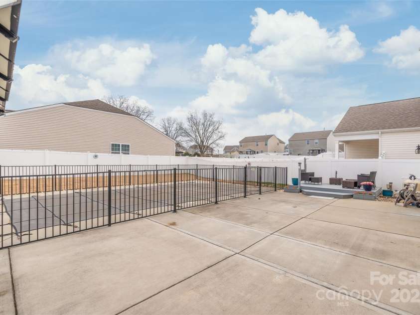 3215 Roan Street, Concord, NC 28027.  MLS# CAR4328709, YatesRealty ID 2767. Get your pool floats ready! You will have everyone's favorite place for outdoor entertaining