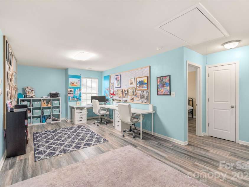 3215 Roan Street, Concord, NC 28027.  MLS# CAR4328709, YatesRealty ID 2767. Office, study, living area, play room.....the list goes on and on