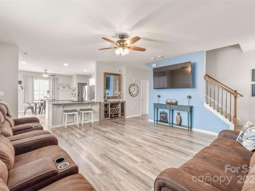 3215 Roan Street, Concord, NC 28027.  MLS# CAR4328709, YatesRealty ID 2767. Open to the kitchen and breakfast area. You will never miss out on the conversation.
