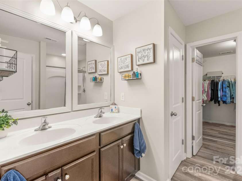3215 Roan Street, Concord, NC 28027.  MLS# CAR4328709, YatesRealty ID 2767. Primary bath offers an oversized counter and dual sinks