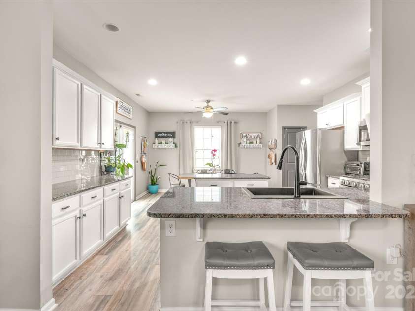 3215 Roan Street, Concord, NC 28027.  MLS# CAR4328709, YatesRealty ID 2767. So much light and space, with abundant cabinetry for all your things