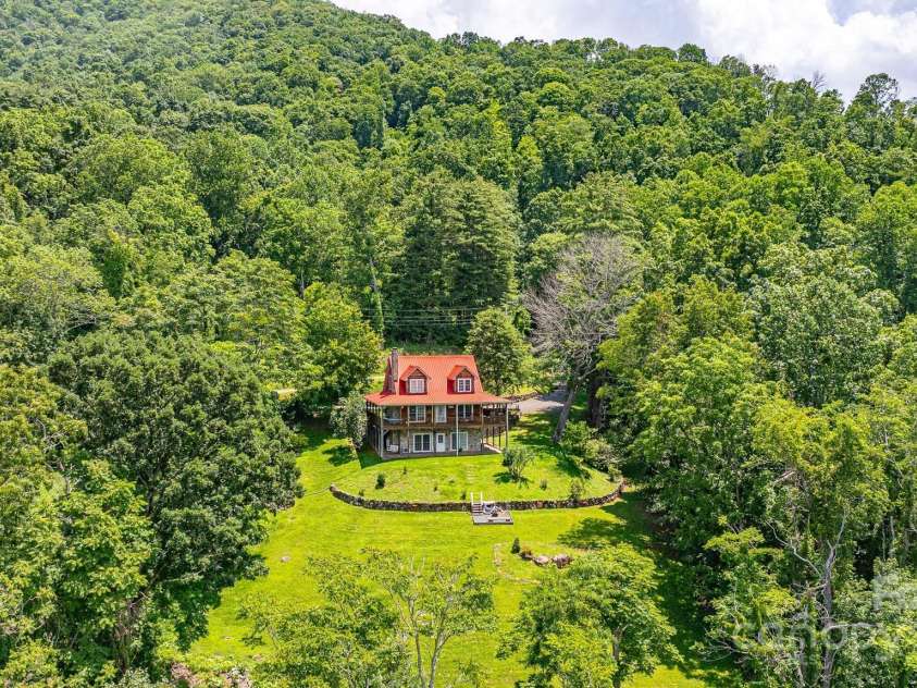 715 Sunset Mountain Road, Bakersville, NC 28705.  MLS# CAR4276207, YatesRealty ID 27672. A view from afar of this lovely home.