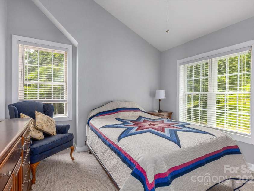 715 Sunset Mountain Road, Bakersville, NC 28705.  MLS# CAR4276207, YatesRealty ID 27672. Bedroom 2 on upper level features huge walk in closet.