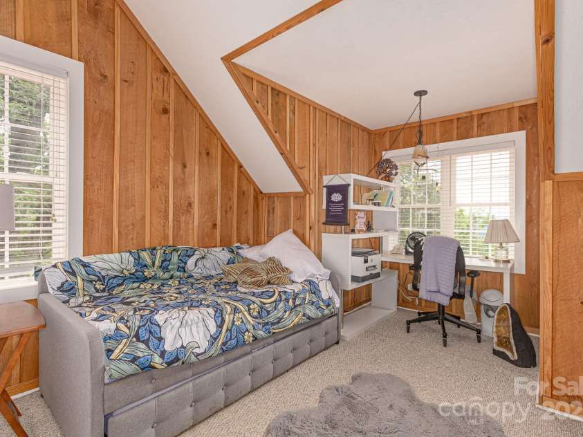715 Sunset Mountain Road, Bakersville, NC 28705.  MLS# CAR4276207, YatesRealty ID 27672. Bedroom 3 on upper level, currently used as an office. Long range view from front window.