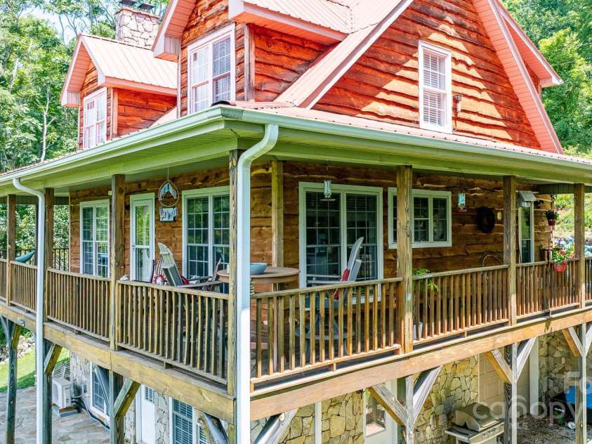715 Sunset Mountain Road, Bakersville, NC 28705.  MLS# CAR4276207, YatesRealty ID 27672. Incredible deck to enjoy the views.