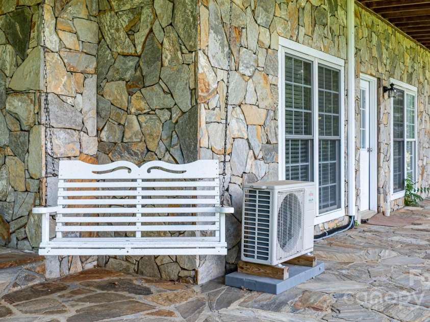 715 Sunset Mountain Road, Bakersville, NC 28705.  MLS# CAR4276207, YatesRealty ID 27672. Stone patio.
