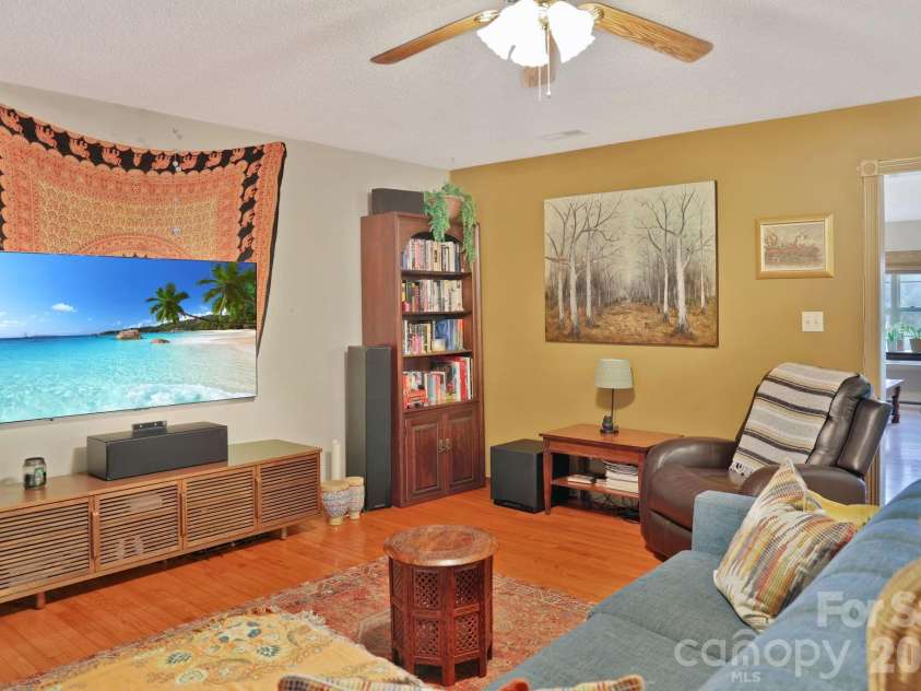 1798 New Stock Road, Weaverville, NC 28787.  MLS# CAR4379856, YatesRealty ID 27678. Den with open concept kitchen and dining room.
