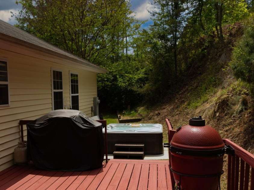 1798 New Stock Road, Weaverville, NC 28787.  MLS# CAR4379856, YatesRealty ID 27678. Freshly painted back deck and patio with hot tub.