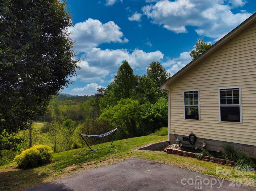 1798 New Stock Road, Weaverville, NC 28787.  MLS# CAR4379856, YatesRealty ID 27678. Privacy, no HOA and mountain views.
