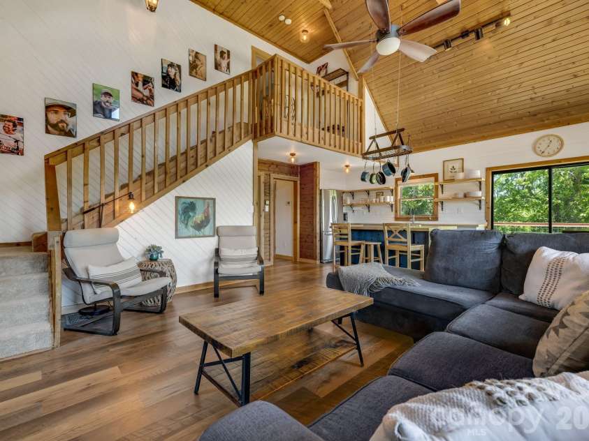 694 Boulder Road, Marshall, NC 28753.  MLS# CAR4384488, YatesRealty ID 27681. Great Room, Kitchen and Stairway to Main Bedroom