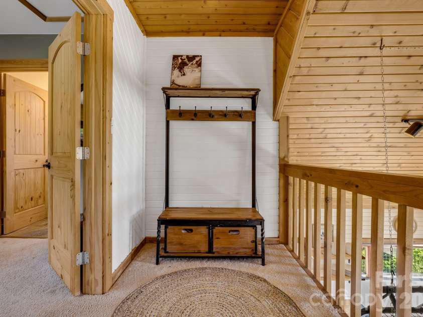 694 Boulder Road, Marshall, NC 28753.  MLS# CAR4384488, YatesRealty ID 27681. Landing for Main Bedroom Upstairs
