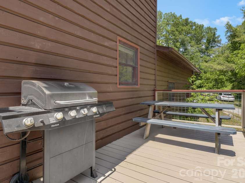 694 Boulder Road, Marshall, NC 28753.  MLS# CAR4384488, YatesRealty ID 27681. Side porch