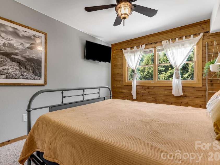 694 Boulder Road, Marshall, NC 28753.  MLS# CAR4384488, YatesRealty ID 27681. Sun filled Main floor bedroom.