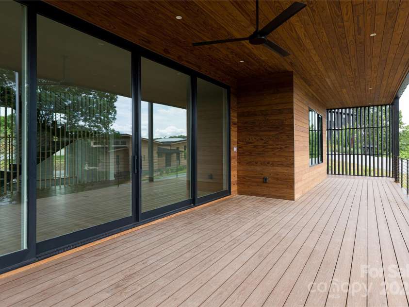 502 Wilma Dykeman Trail, Asheville, NC 28804.  MLS# CAR4271749, YatesRealty ID 27683. Back Deck Wraps Around to Connect with Front of the Home