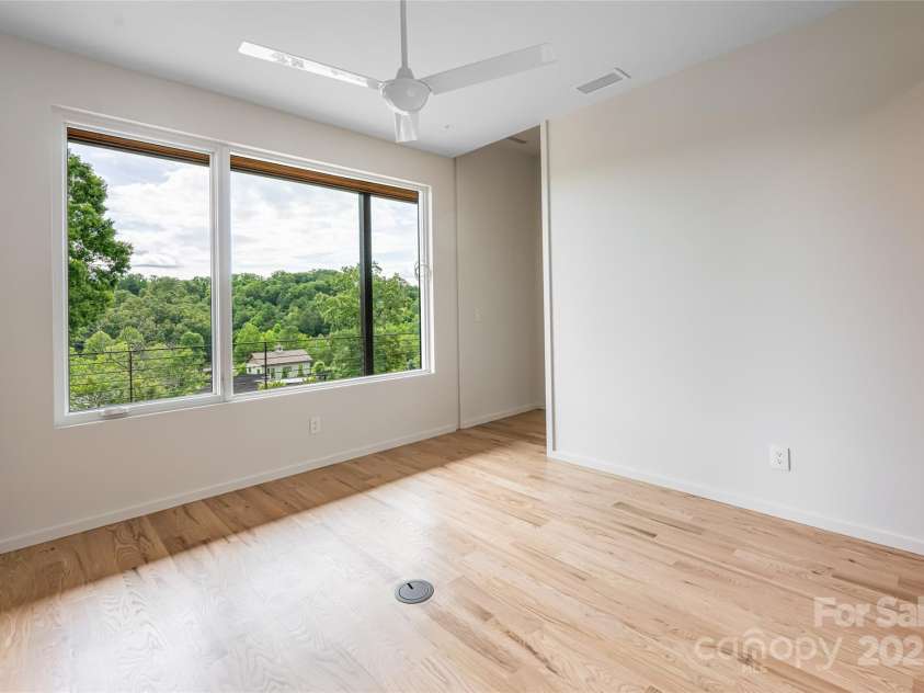 502 Wilma Dykeman Trail, Asheville, NC 28804.  MLS# CAR4271749, YatesRealty ID 27683. Bedroom Suite On Main with Tree-Top Views