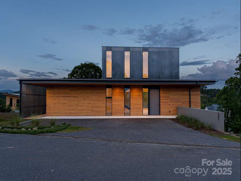 502 Wilma Dykeman Trail, Asheville, NC 28804.  MLS# CAR4271749, YatesRealty ID 27683. Front parking as well as lower garage