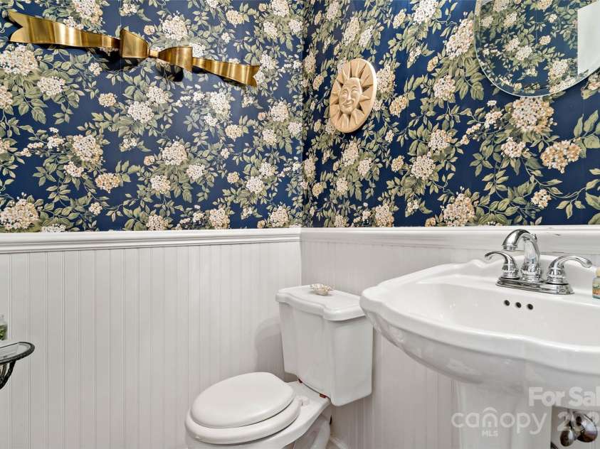 60 Valley View Drive, Marion, NC 28752.  MLS# CAR4217189, YatesRealty ID 27684. Main level half bath