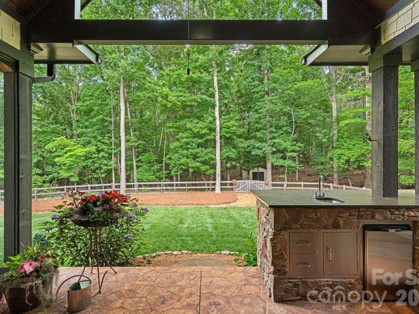 6808 Live Oaks Lane, Waxhaw, NC 28173.  MLS# CAR4388125, YatesRealty ID 27688. Covered Porch 