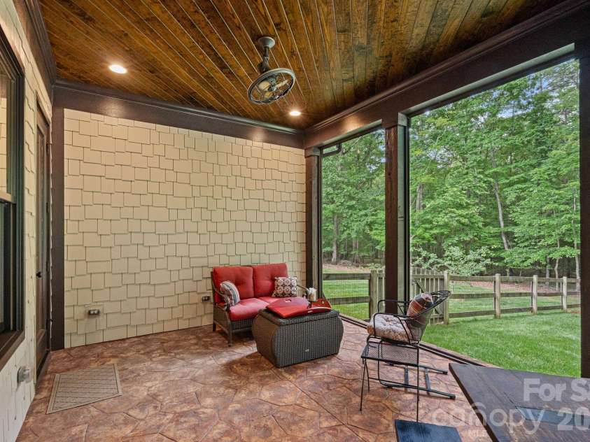 6808 Live Oaks Lane, Waxhaw, NC 28173.  MLS# CAR4388125, YatesRealty ID 27688. Screened poroch 
