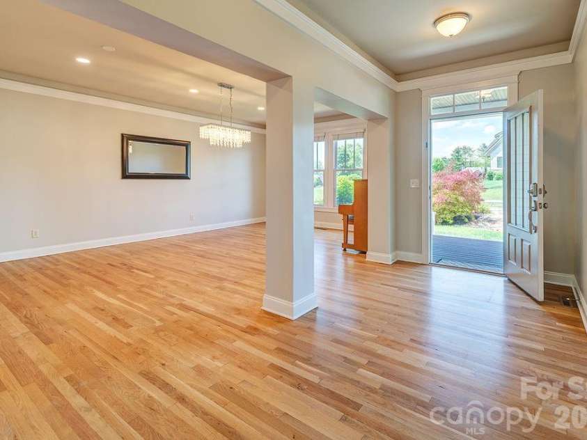 201 Skytop Farm Lane, Hendersonville, NC 28791.  MLS# CAR4387664, YatesRealty ID 27689. Front Entry and dining room