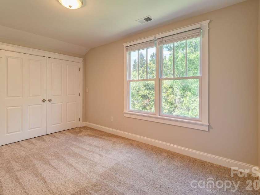 201 Skytop Farm Lane, Hendersonville, NC 28791.  MLS# CAR4387664, YatesRealty ID 27689. Second floor bedroom. 