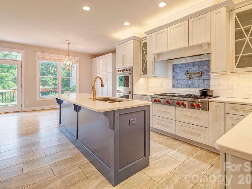 201 Skytop Farm Lane, Hendersonville, NC 28791.  MLS# CAR4387664, YatesRealty ID 27689. Stunning kitchen expansion and renovation - Wolf cooktop and pasta arm for masterful cooking