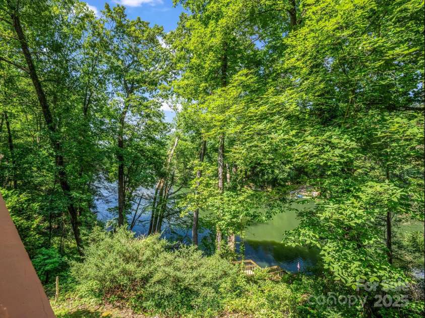 126 Sleeping Bear Lane, Lake Lure, NC 28746.  MLS# CAR4276702, YatesRealty ID 27694. 