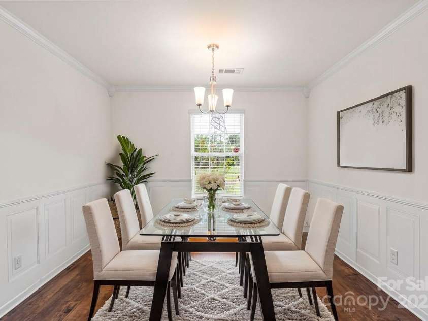 2515 Walnut Forest Drive, Charlotte, NC 28216.  MLS# CAR4260592, YatesRealty ID 27696. Formal Dining Room with beautiful wainscoting