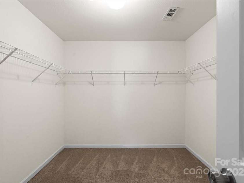2515 Walnut Forest Drive, Charlotte, NC 28216.  MLS# CAR4260592, YatesRealty ID 27696. Large Primary Closet 9'x0 X 9'x8