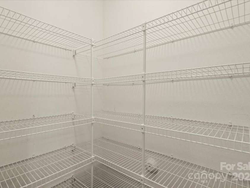 2515 Walnut Forest Drive, Charlotte, NC 28216.  MLS# CAR4260592, YatesRealty ID 27696. Spacious Pantry
