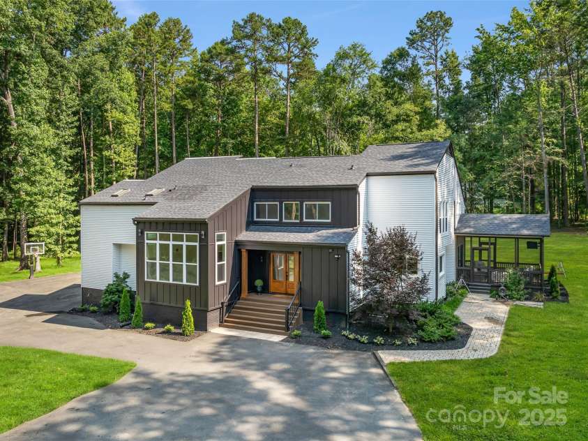 202 Walden Lane, Weddington, NC 28104.  MLS# CAR4274897, YatesRealty ID 27698. Custom details & circular driveway